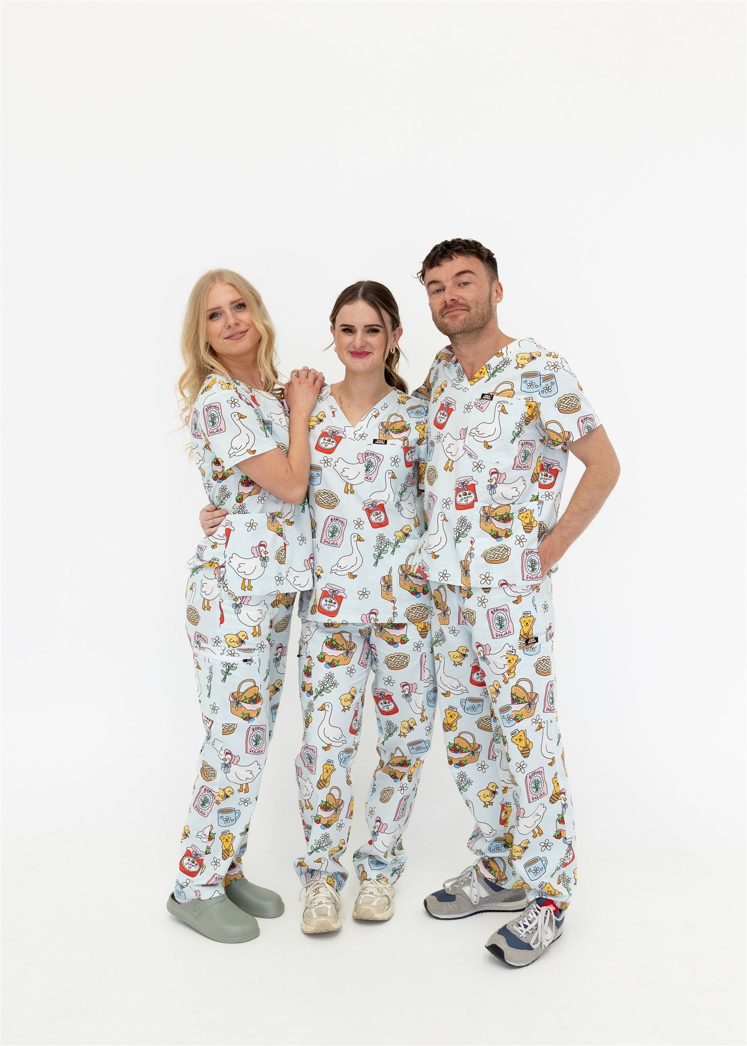 group of nurses wearing cottage core themed scrub set