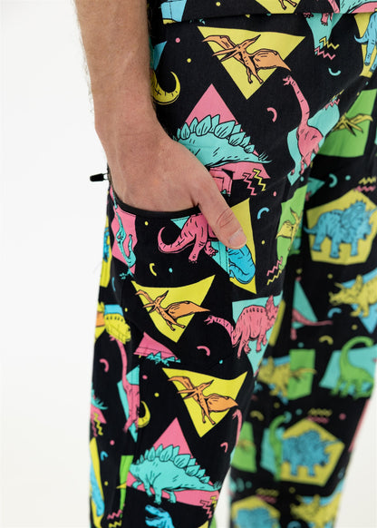 man in black and bright colour retro Dino scrub set pants