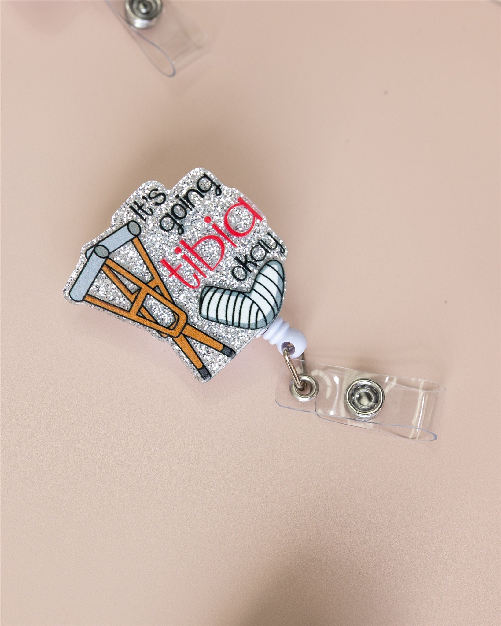 ITS GOING TIBIA OK BADGE REEL