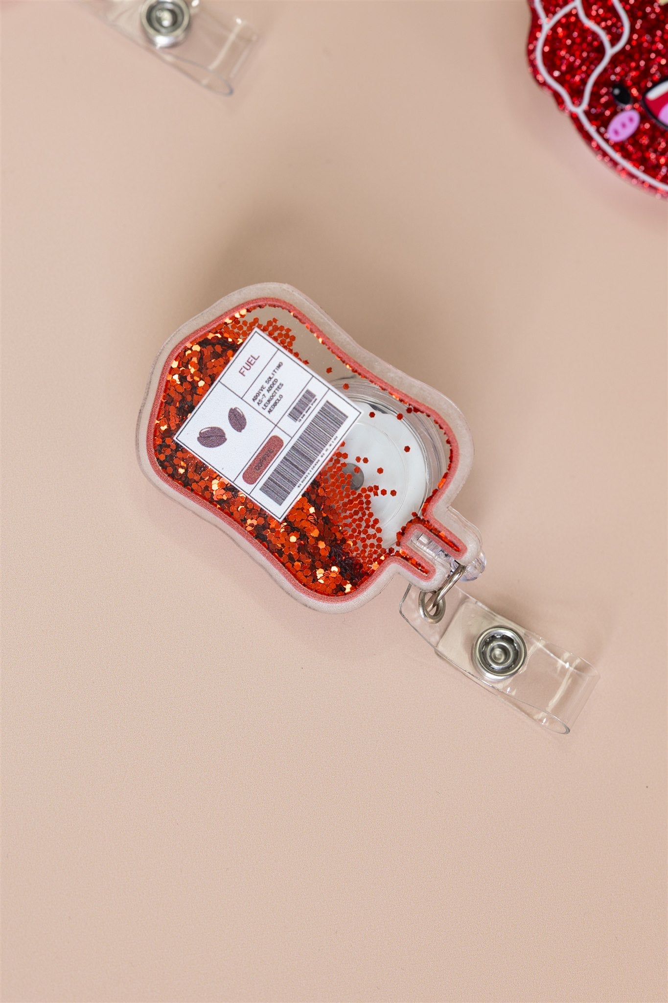 CAFFEINE FUELLED BADGE REEL
