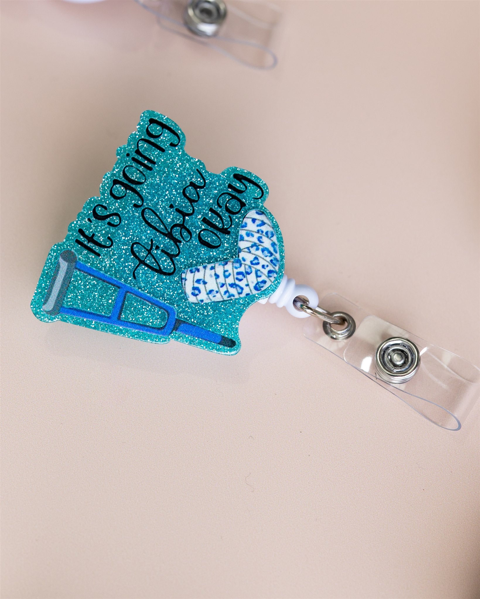 ITS GOING TIBIA OK BADGE REEL